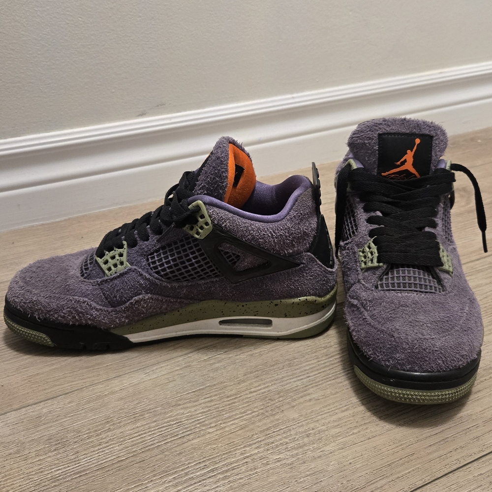 Jordan Purple and Black Sneakers with Orange Accents
